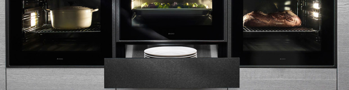 Подогреватели посуды Asko монтируются под компактный духовой шкаф или кофемашину